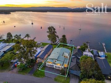 Spacious family home on ¼ acre waterfront parcel with jetty & boatshed