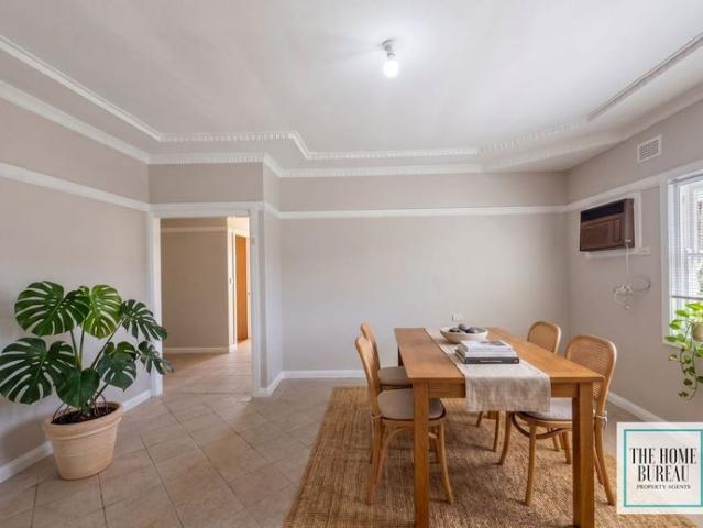 Spacious Family Home on Approx. ½ Acre with Stunning Mountain Views