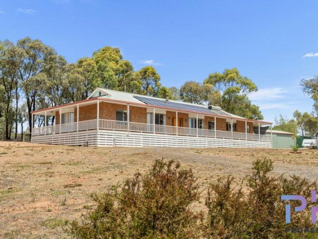 SPACIOUS FAMILY HOME ON OVER 1 ACRE WITH SUBDIVISION POTENTIAL!
