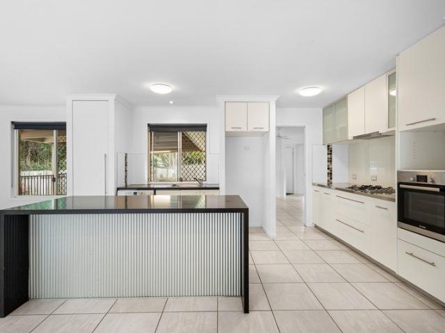 Spacious Family Home Opposite Golf Course with Pool & Bushland Outlook