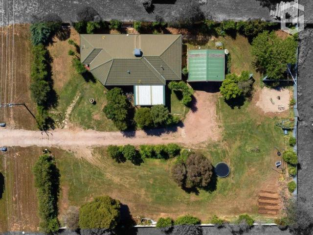 Spacious Family Living on a Generous Allotment