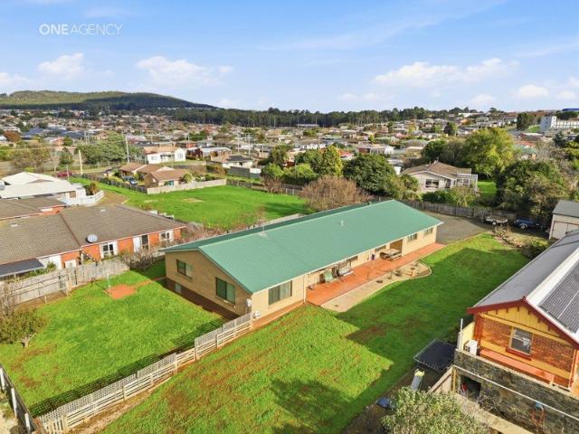 Spacious Family Living on Approximately Half an Acre in Town!