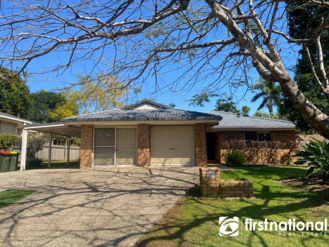 Spacious Family Living on Bellmere's Most Attractive Town Street