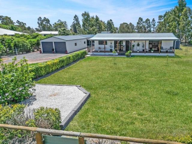 Spacious Family Living on 1.2 Acres Minutes from Town