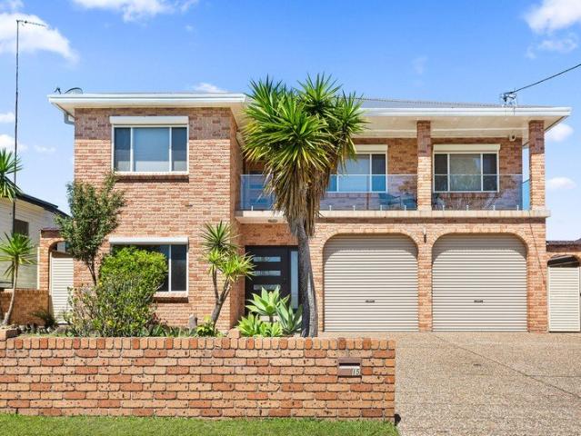 Spacious Family Living, Exceptional Garaging & Coastal Convenience