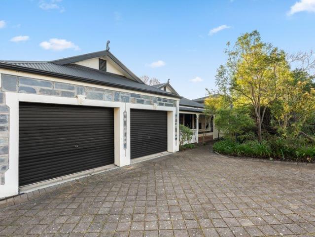Spacious Family Living in a Peaceful Woodcroft Setting