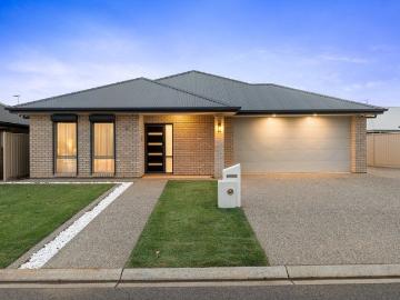 Spacious Family Living in a Thriving Community