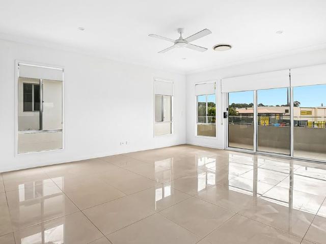 Spacious Family Living in the Heart of Hope Island!