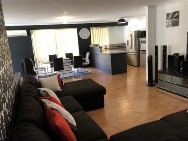 SPACIOUS FAMILY LIVING IN THE HEART OF MEADOW SPRINGS