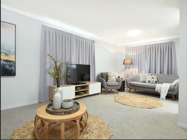 Spacious Family Living in the Heart of Middle Ridge!