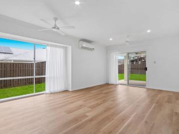 Spacious Family Living in the Sought After and Secure Riverstone Crossing Community