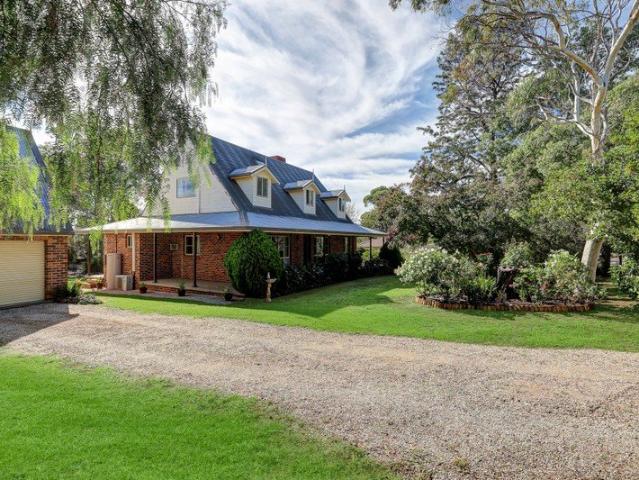 Spacious Family Living Surrounded by Established Gardens