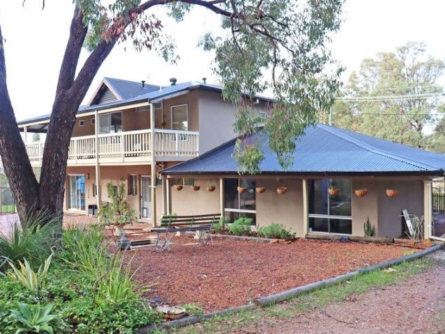 SPACIOUS FAMILY LIVING WITH A POOL & MORE!