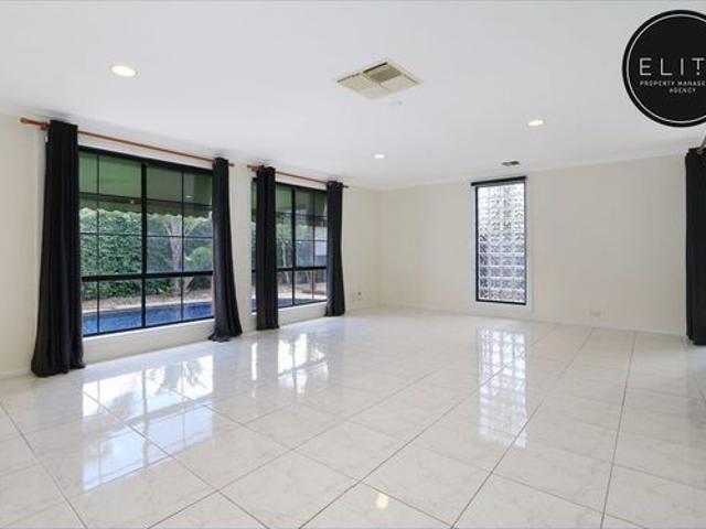 SPACIOUS FAMILY LIVING WITH A POOL AND IMPRESSIVE SHEDDING