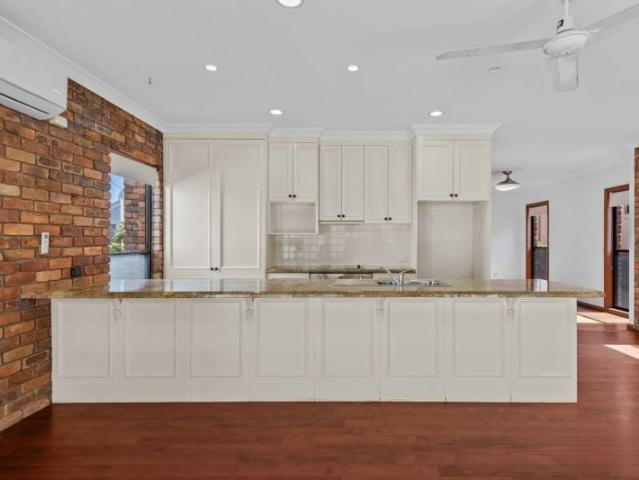 spacious family living with a private poolside lifestyle