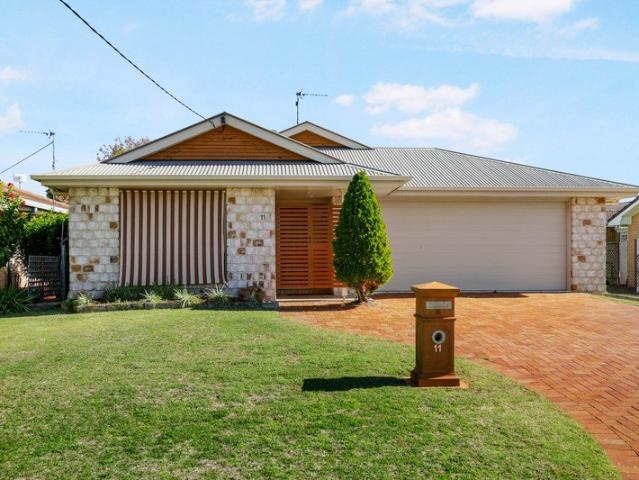 Spacious Family Living with an Impressive Powered Shed