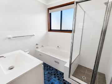 Spacious Family Living with Balcony, Yard & Lake Lifestyle Nearby