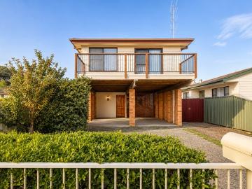 Spacious Family Living with Balcony, Yard & Lake Lifestyle Nearby