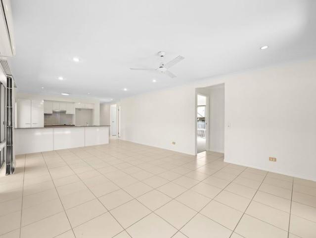 SPACIOUS FAMILY LIVING WITH GOOD SIZE YARD