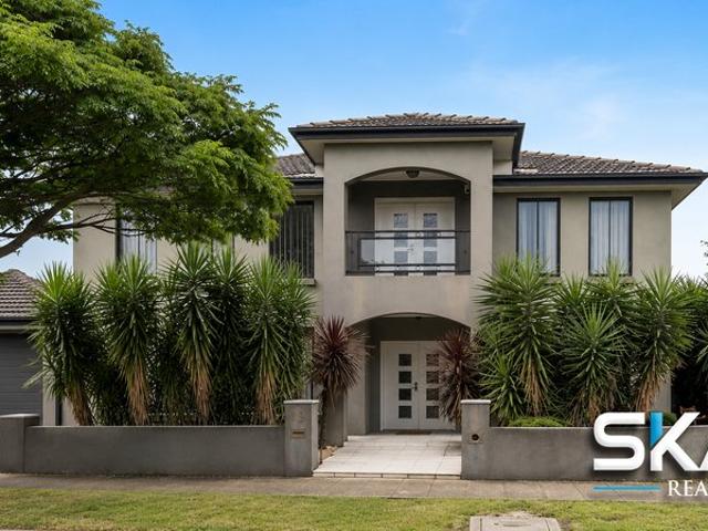 Spacious Family Living with Dual Kitchens & Four Living Zones !