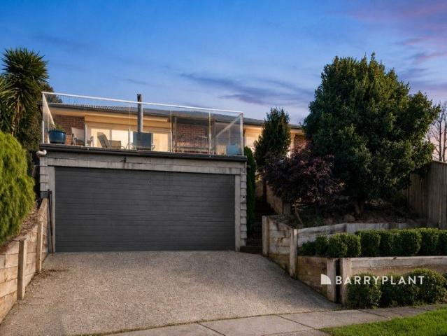 Spacious Family Living with Elevated Views in a Peaceful Court Setting