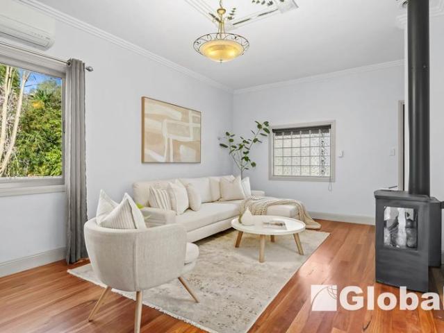 Spacious Family Living with Exceptional Garaging & Secure Gated Entry