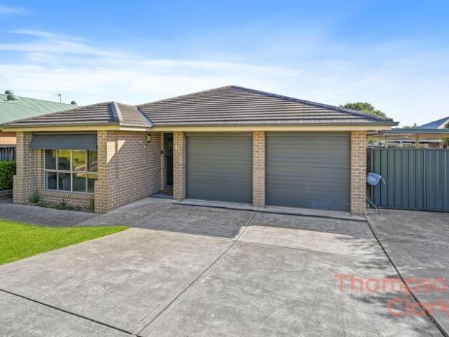Spacious Family Living with Exceptional Side Access!