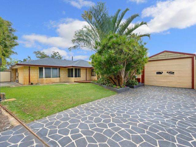 Spacious Family Living with Exceptional Parking & Workshop Access