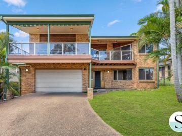 Spacious Family Living with High Ceilings and Stunning Lake Views
