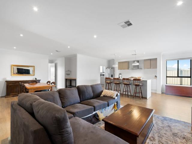 Spacious Family Living with Huge Backyard & Rainwater Savings