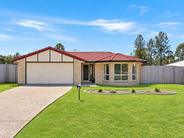 Spacious Family Living with Modern Updates & Side Access