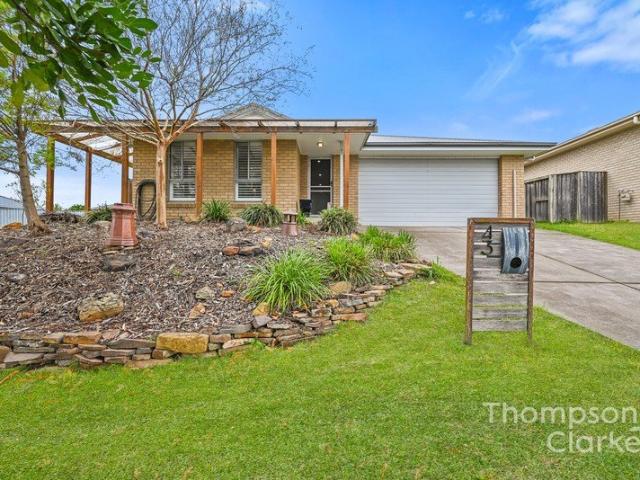 Spacious Family Living with Multiple Living Areas in a Prime Location!