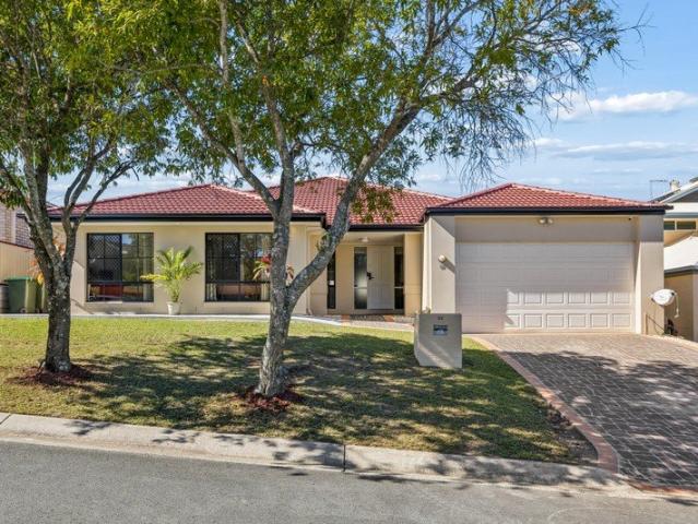 Spacious Family Living with Multiple Living Zones in a Peaceful Setting!