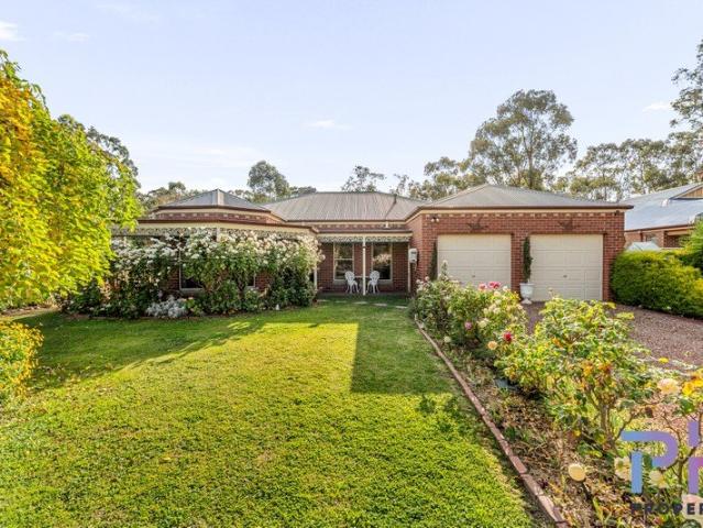 SPACIOUS FAMILY LIVING WITH SIDE ACCESS TO LARGE SHED!