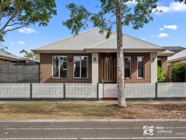 Spacious Family Living with the Bonus of Private Rear Laneway for Extra Parking!