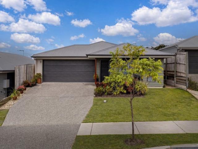 Spacious 4 Bedroom Home with Multiple Living Areas!