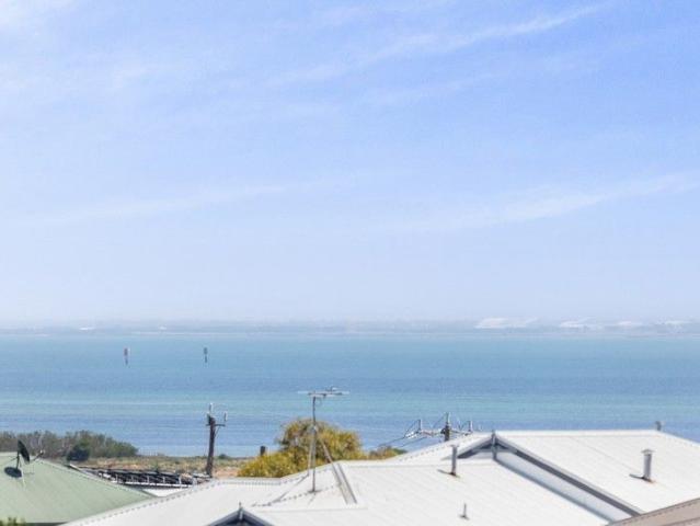 Spacious Family Retreat on a Massive 1,240m² Block with Bay Views