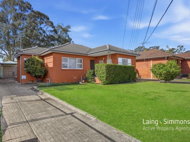 Spacious Family Residence with Development Potential!