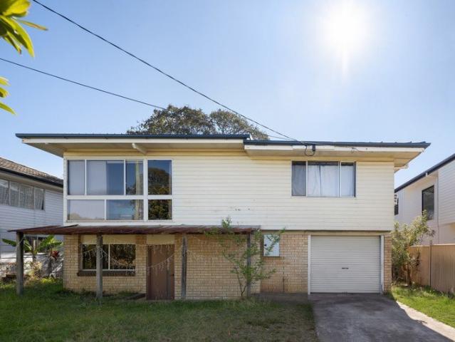 Spacious Five Bedroom Home with Multiple Living Areas & Huge Potential