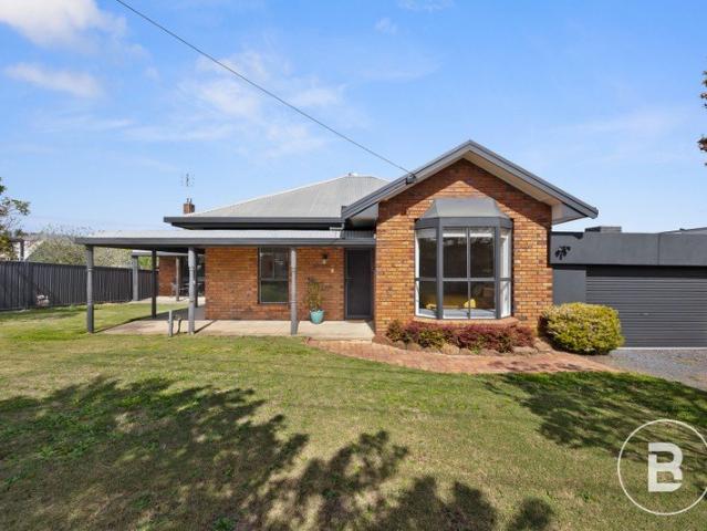 Spacious Four Bedroom Brick Home in Convenient Location
