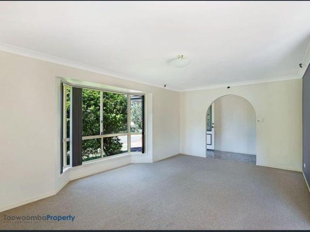 Spacious, four bedroom family home, conveniently located near shops, parks & USQ!