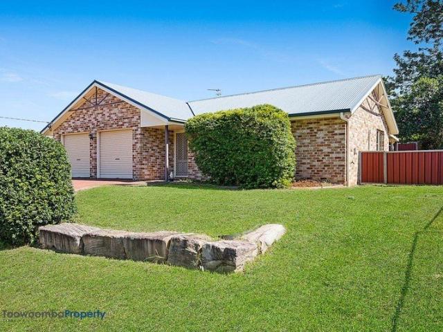 Spacious, four bedroom family home, conveniently located near shops, parks & USQ!