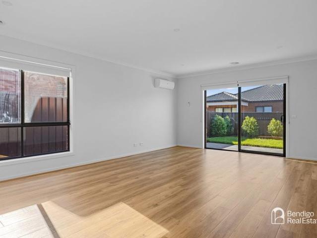 SPACIOUS FOUR BEDROOM FAMILY HOME WITH YEAR ROUND COMFORT
