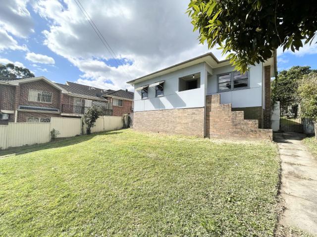Spacious Four Bedroom Family Home with Large Backyard