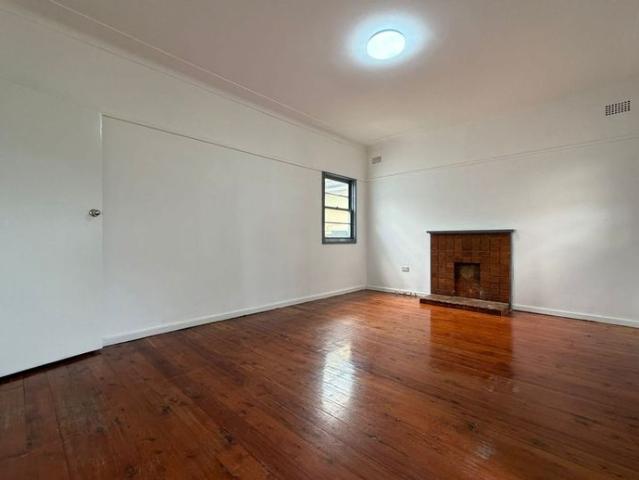 Spacious Four Bedroom Family Home with Large Backyard