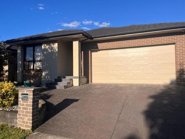 Spacious Four Bedroom Family Home with Multiple Living Areas!