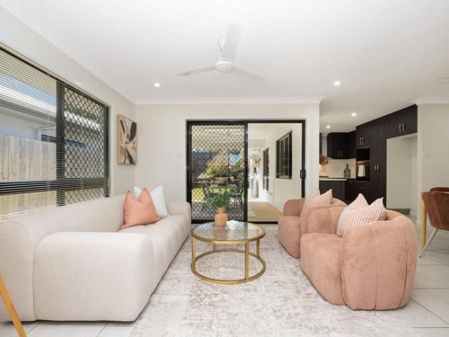 Spacious Four Bedroom Family Home with Multiple Living Areas in Sought After Idalia