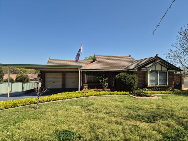 Spacious Four Bedroom Home with Exceptional Parking Space!