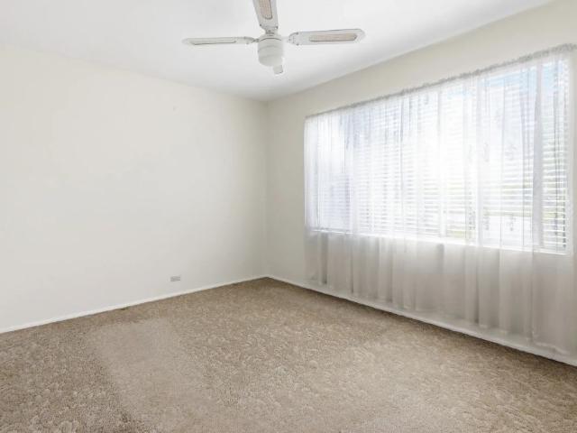 Spacious Four Bedroom Home with Large Backyard