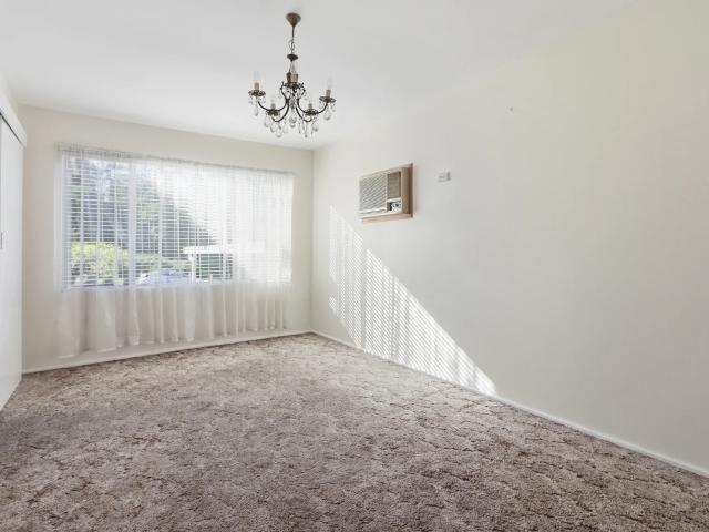 Spacious Four Bedroom Home with Large Backyard